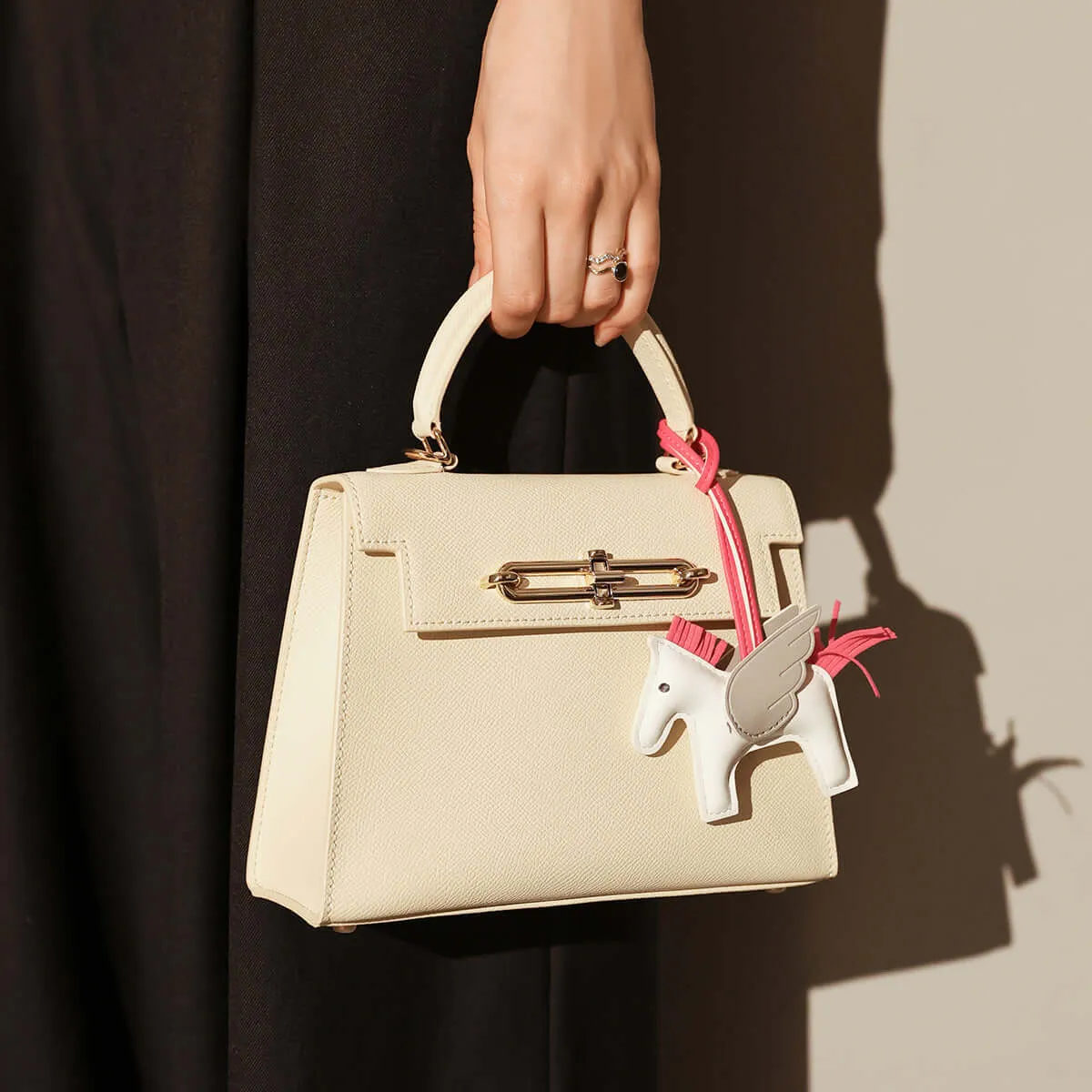 Classic Handbag with a Unicorn Bag Charm