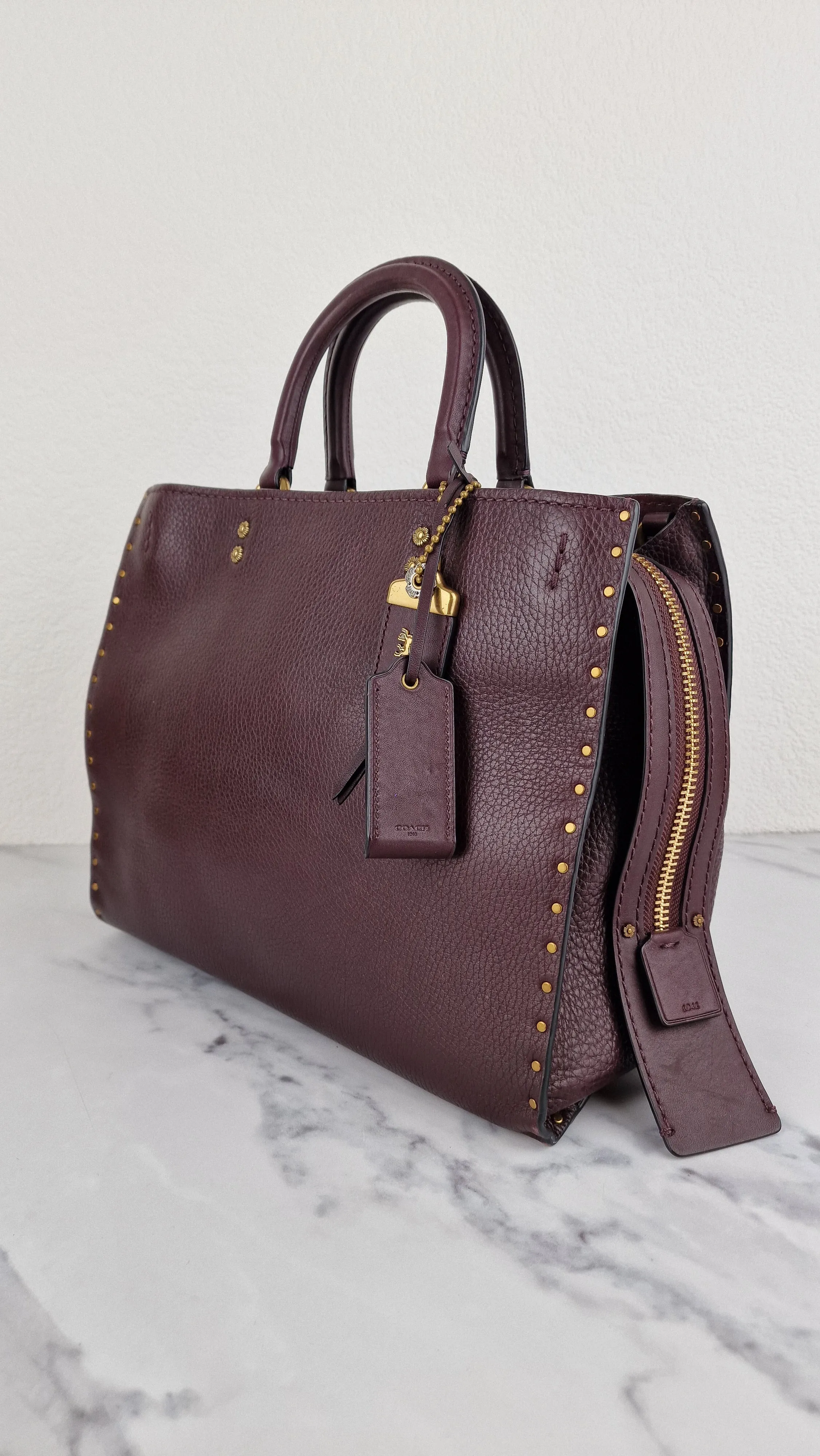 Coach 1941 Rogue 31 in Oxblood Pebble Leather with Border Rivets & Brass Hardware - Coach 30457