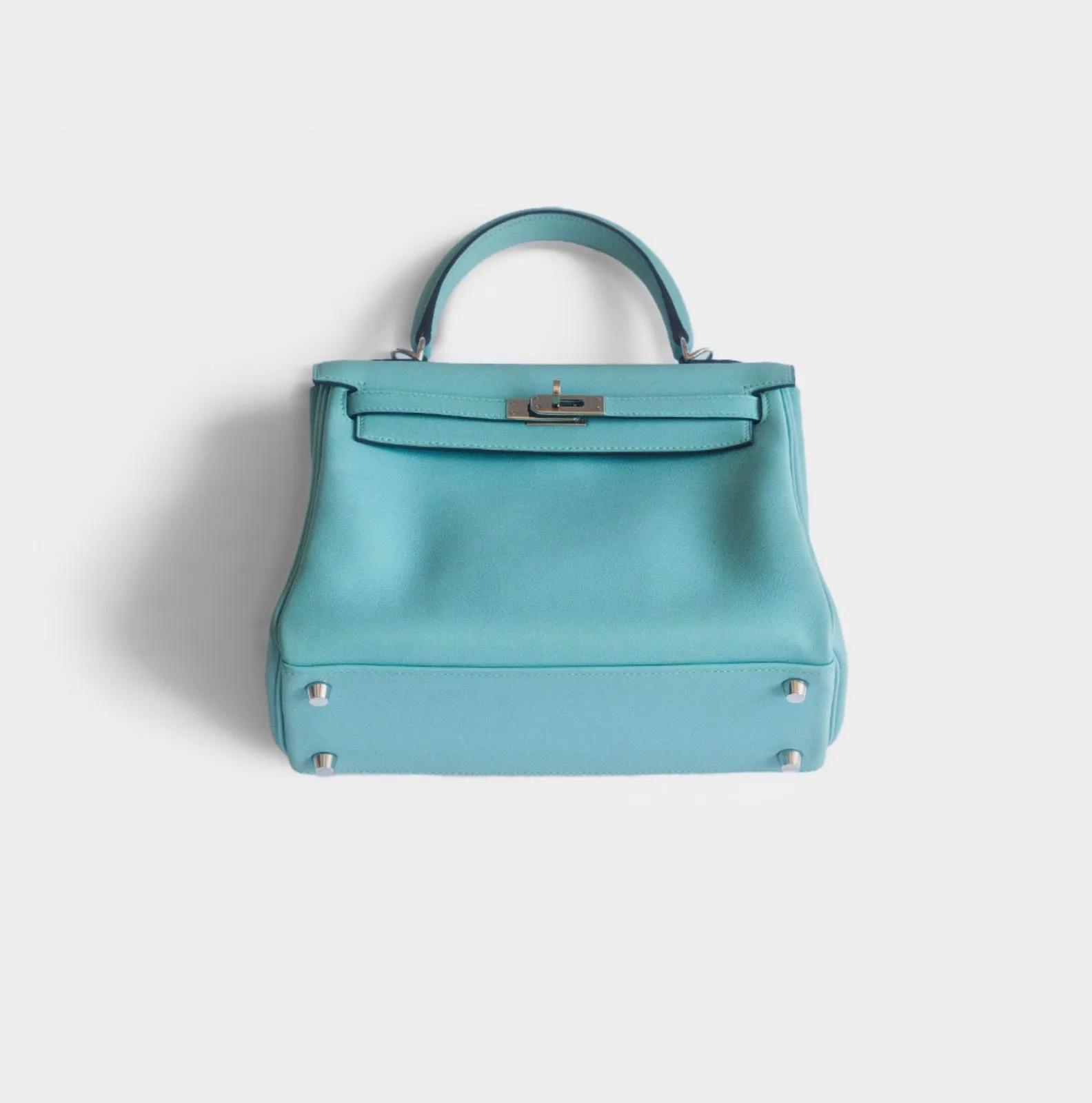 HERMÈS -  KELLY 25 BAG IN LIGHT BLUE SWIFT LEATHER WITH PALLADIUM HARDWARE