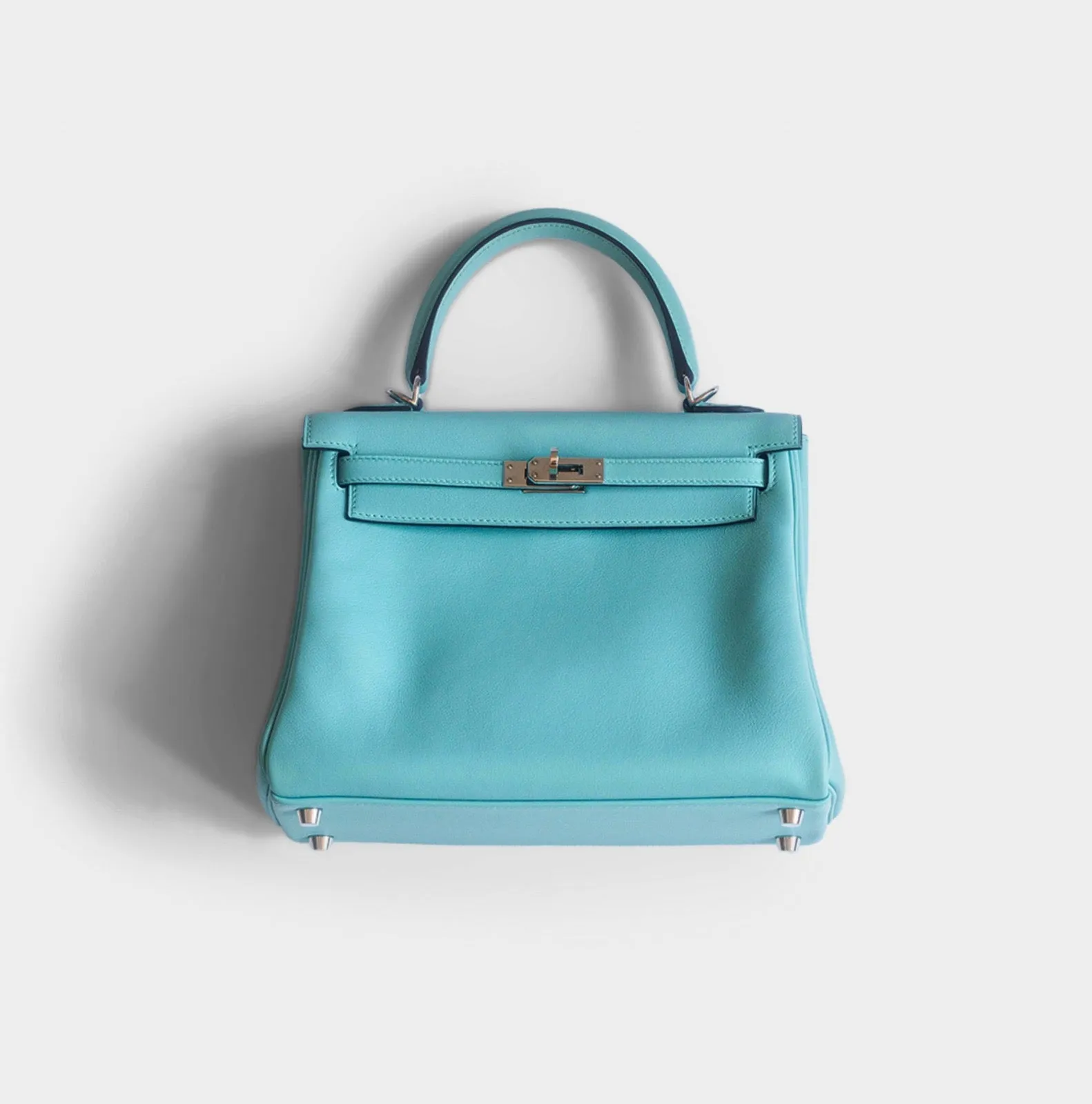 HERMÈS -  KELLY 25 BAG IN LIGHT BLUE SWIFT LEATHER WITH PALLADIUM HARDWARE